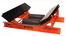 Cradles reduce dust emissions by creating a sealed environment between the belt and skirting.